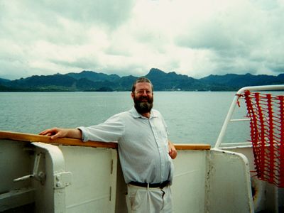 Paul On The Andi Savu Savu - Leaving Suva (in the background) 2001
